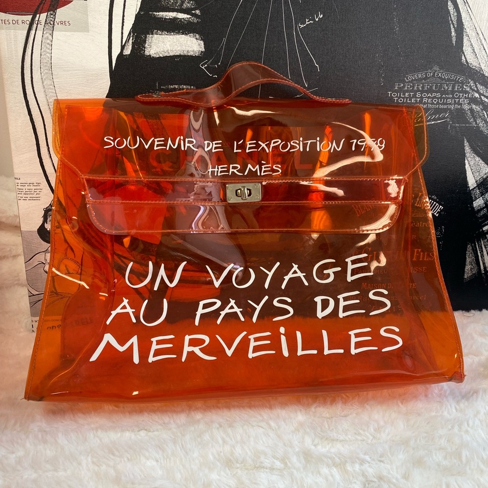 HERMES
Vinyl Souvenir De L'Exposition Kelly Orange